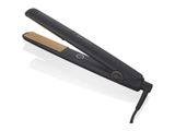 a flat iron with a flat iron on top of it