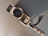a small camera sitting on top of a table