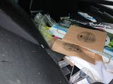 a bag of food in the trunk of a car