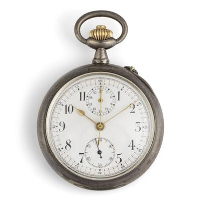 a silver pocket watch on a white surface with a white background