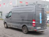 a van that is parked on the side of the road