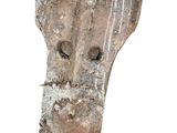 a piece of pottery that has been carved into the shape of a horse ' s head