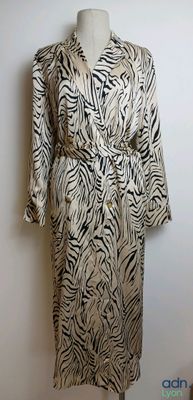 an image of a zebra print dress on a mannequin mannequin