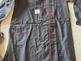 grey dress with red piping and buttons on the chest