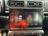 a picture of a car dashboard with a digital display