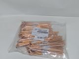 a bag of copper wire wrapped in plastic on a table