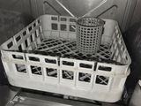 an image of a dishwasher with a basket inside of it