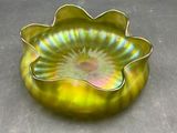 a glass bowl that is sitting on a table