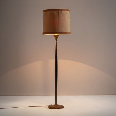 a lamp that is sitting on a table with a lamp on it