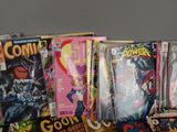a lot of comic books sitting on a table