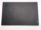 an image of a black mouse pad on a white surface