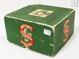 a green box with a red and white label on it