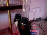 a blender that is sitting on a counter in a kitchen