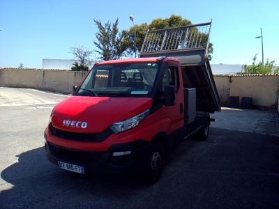 a red truck that is parked in a parking lot