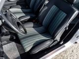 a picture of the interior of a car with a steering wheel
