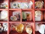 many bottles and containers in a red box