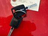 a picture of a car key with a price tag attached to it