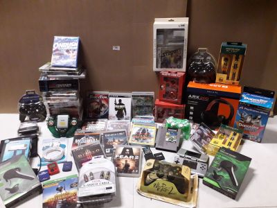 Important lot de jeux video, accessoires gaming, manette cas…