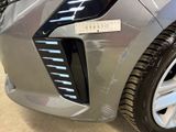 a close up of a car that has a sticker on the front of it