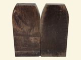 pair of wooden bookends with a brown patt finish on a white background