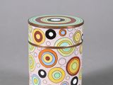 a small tin with a colorful design on it