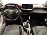 the interior of a car with a steering wheel and dashboard controls