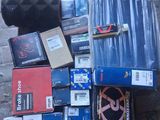 a pile of books and other items on the ground
