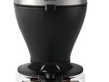 a close up of a coffee maker on a white surface