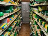 a long aisle in a grocery store filled with boxes