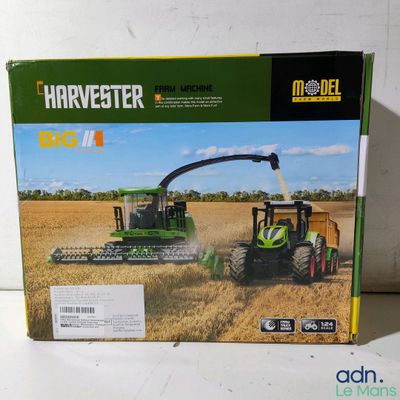 a box with a picture of a tractor and a combiner in it