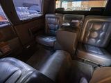 a view of the inside of a car with leather seats