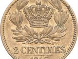 a gold coin with a crown on top of it