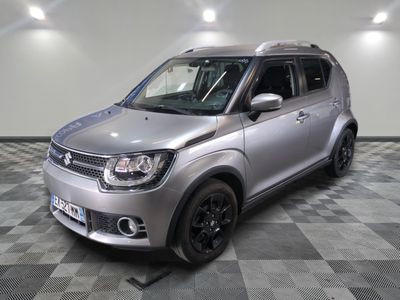 a picture of a silver car parked in a garage
