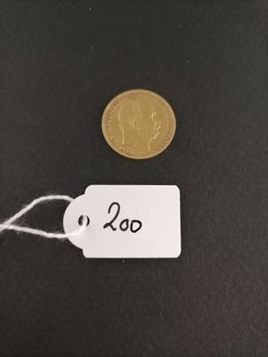 a close up of a coin with a price tag on it