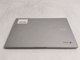 a laptop that is sitting on a white surface