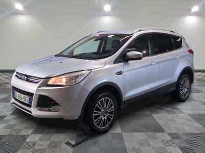 the white ford kuga is parked on a checkered tile floor