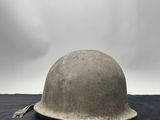 a close up of a helmet on a black surface