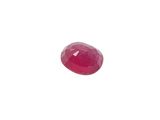 a red ruby stone on a white background