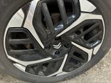 a close up of a tire on a car ' s rim