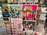 many greeting cards on display in a store
