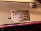 a plaque on the back of a car with a picture of a man