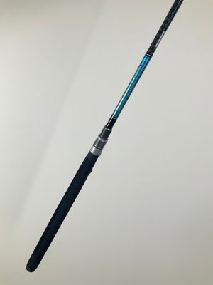 a close up of a fishing rod on a white background