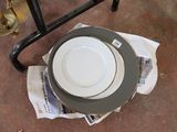 a stack of plates sitting on top of a table