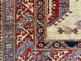 an oriental rug with a red and blue design on it