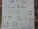 a piece of paper with writing on it sitting on a table