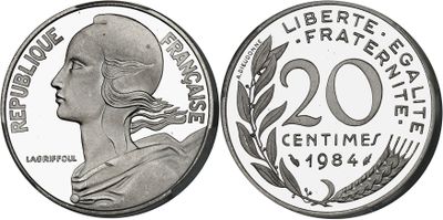 a close up of a coin with a woman ' s face on it
