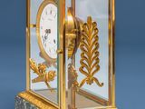 a clock that is sitting on top of a table