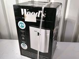 a box that is sitting on a table with a phone in it