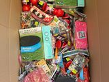 a cardboard box filled with assorted items in it