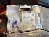 a plastic case with items in it on a table